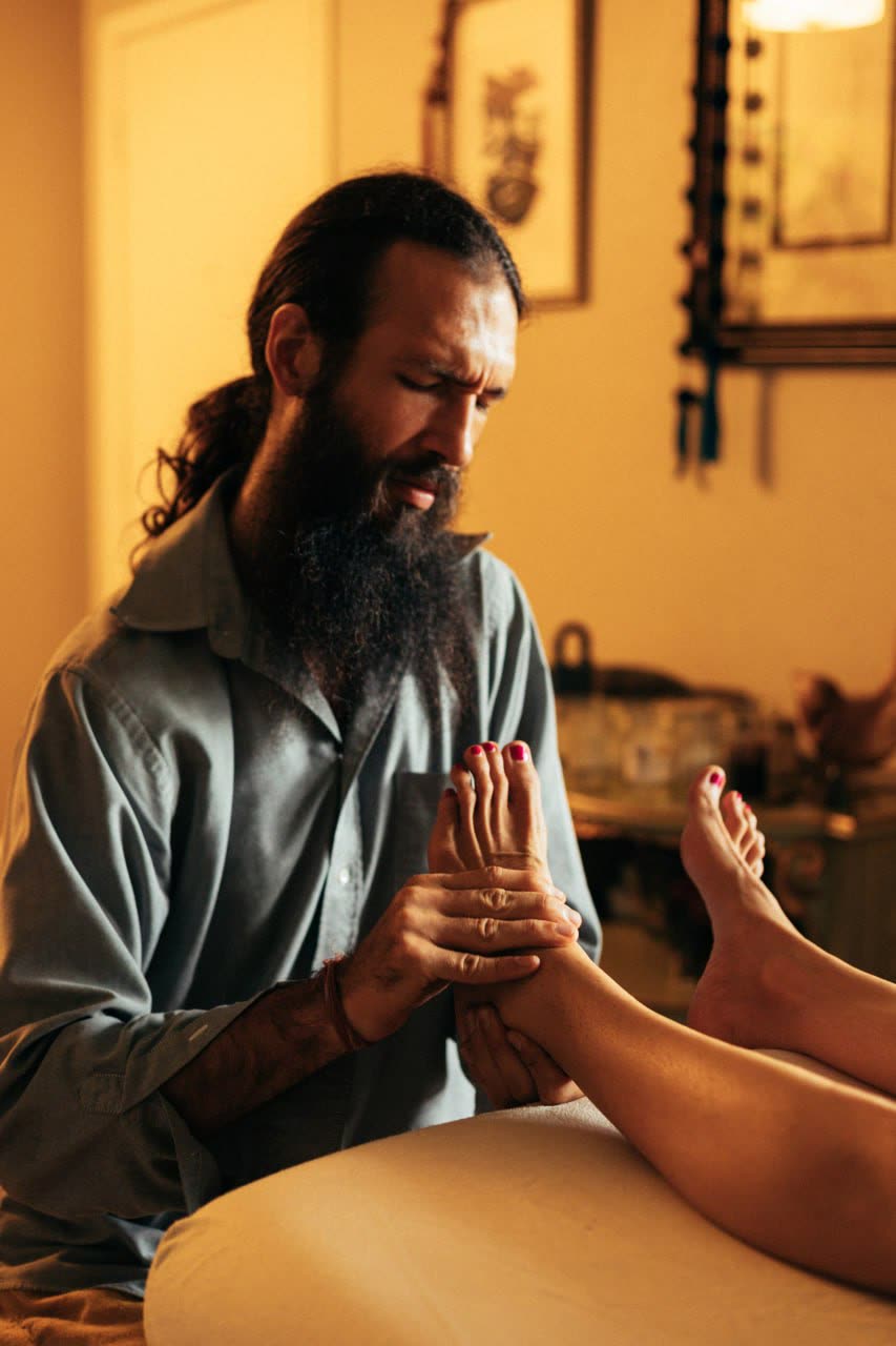 Warm golden light during an in-person session at the table